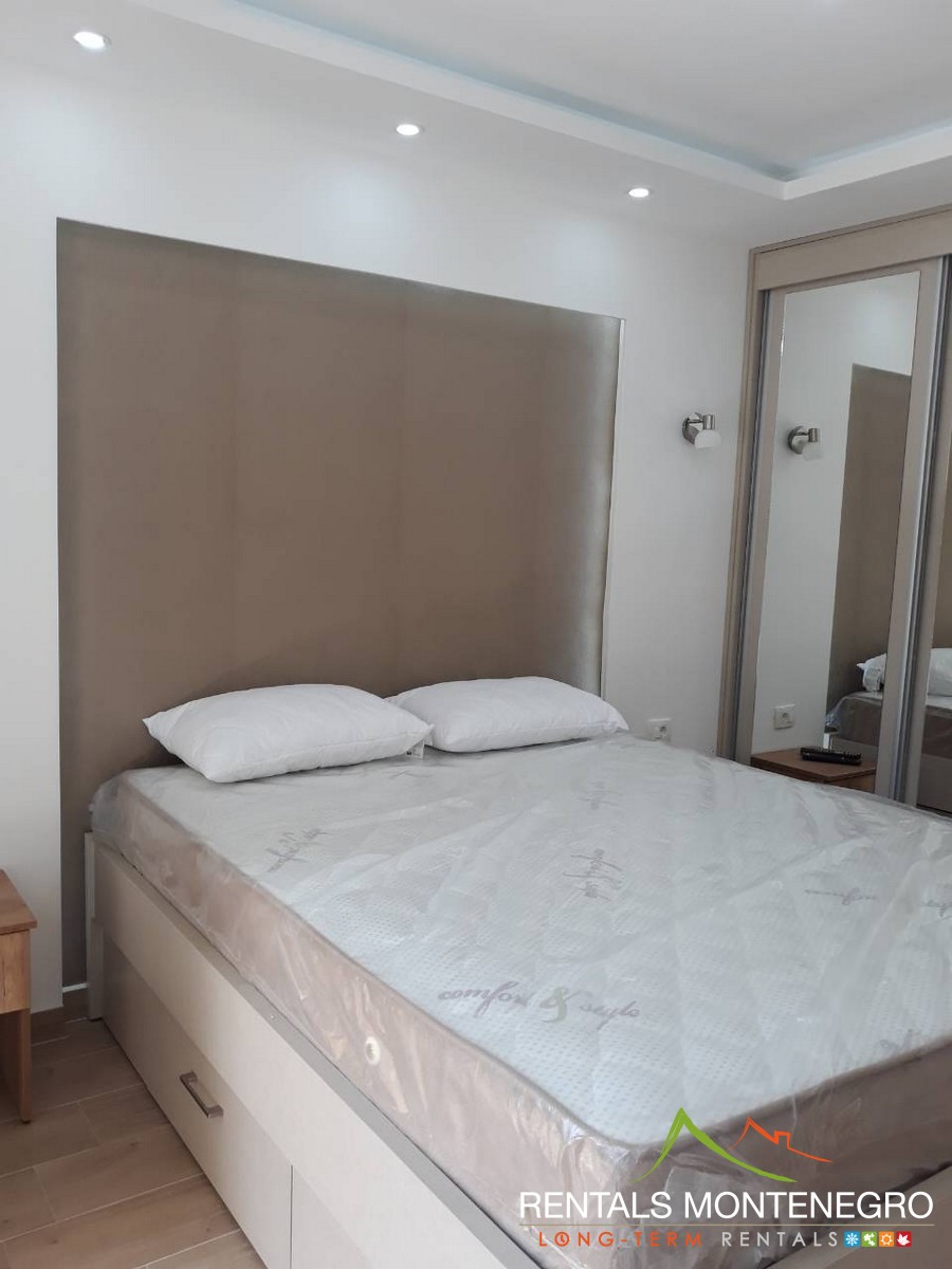 One bedroom with big double bed, night tables and wardrobe