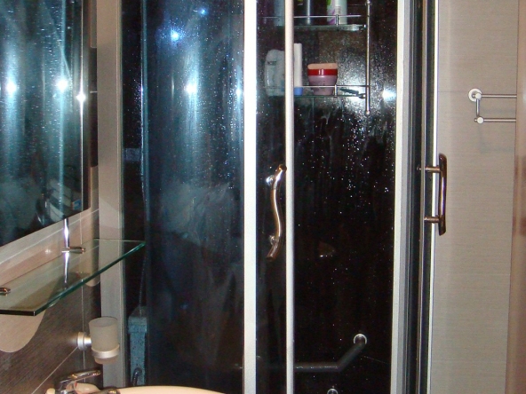 Bathroom with shower and hydro-massage cabin