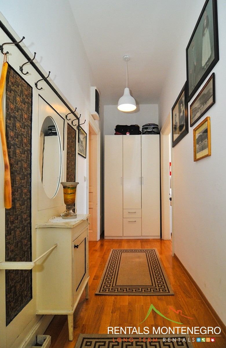 Big hallway with wardrobe in two bedroom apartment